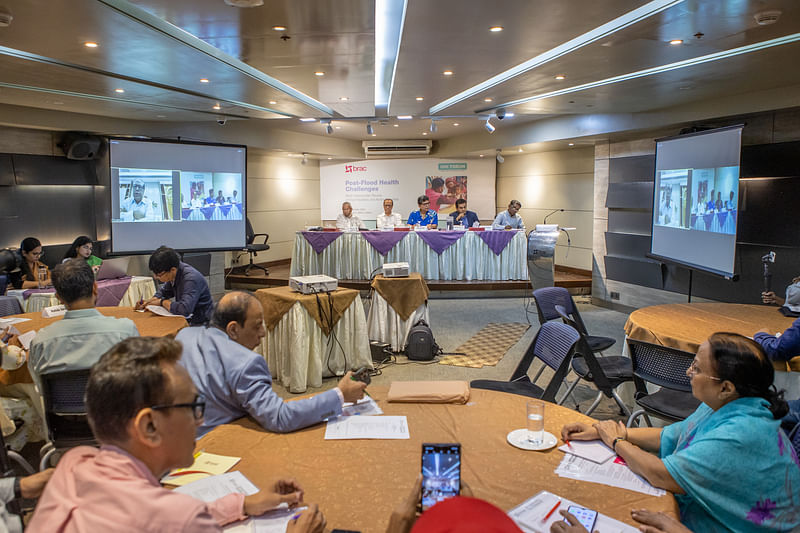 Guests at a dialogue titled 'Post-Flood Health Challenges: Multi-stakeholder Review of Field Realities and Action Priorities' organised by BRAC and the UHC Forum in Dhaka on 4 September 2024.